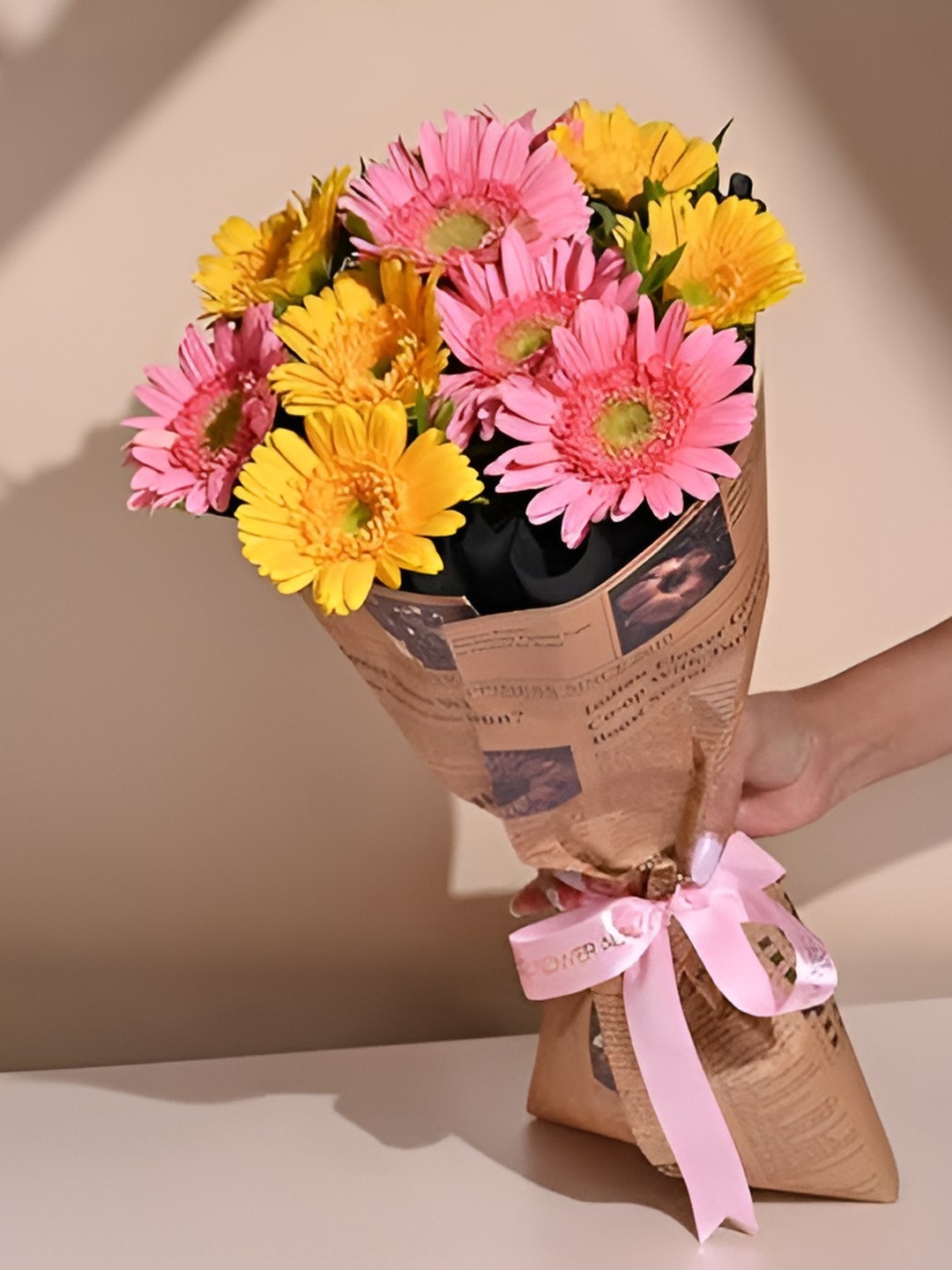 

Floweraura Pink & Yellow 10 Pieces Fresh Gerberas Bouquet