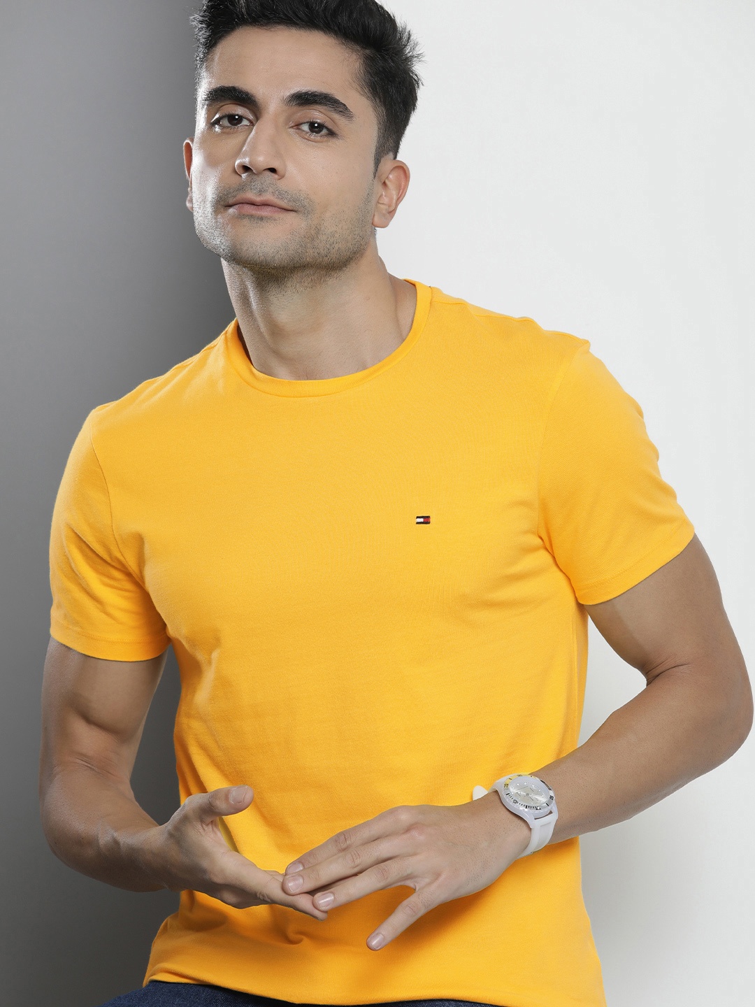 

Tommy Hilfiger Round Neck Slim Fit Solid Casual T-shirt, Yellow