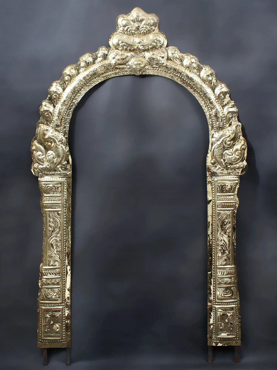 

Exotic India Gold-Toned Thiruvachi Arch Brass Temple Prabhavali