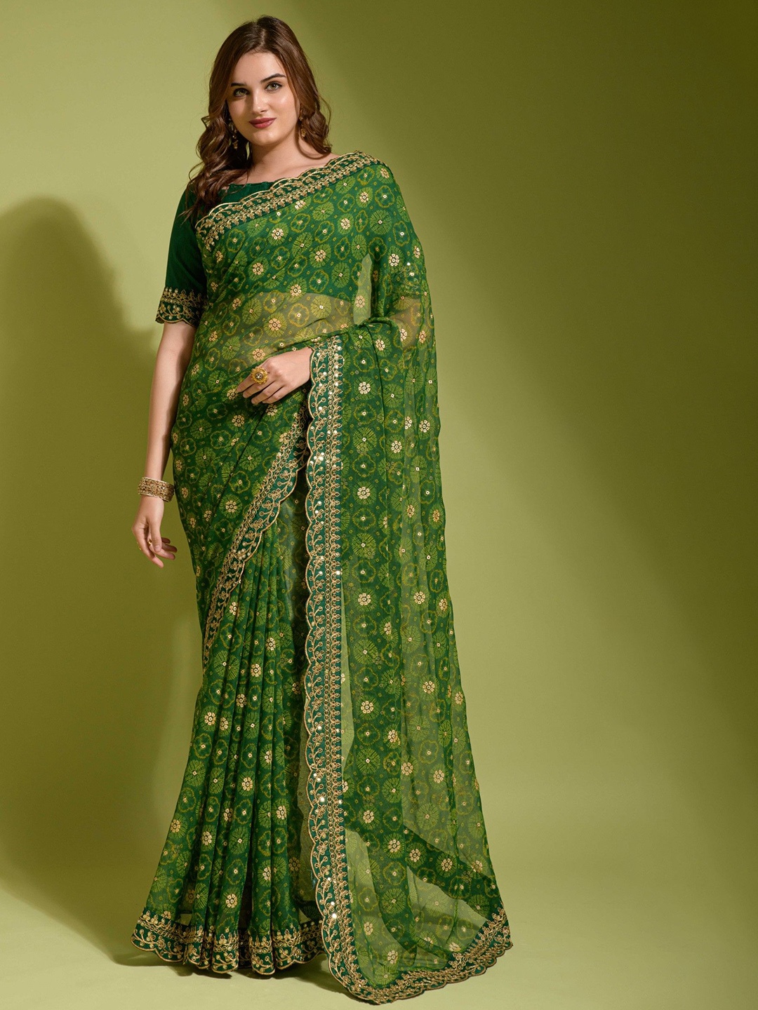 

Panzora Floral Printed Embroidred Bordered Saree, Green