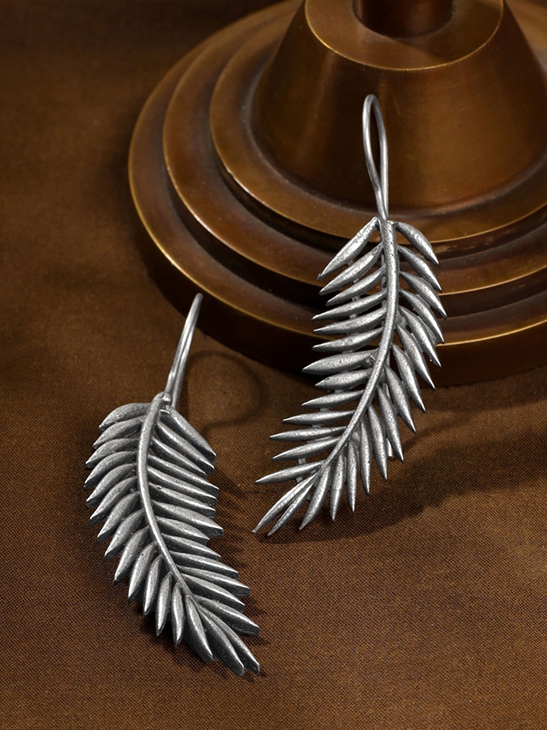 

Yellow Chimes Oxidised Silver Plated Leafy Shaped Drop Earrings