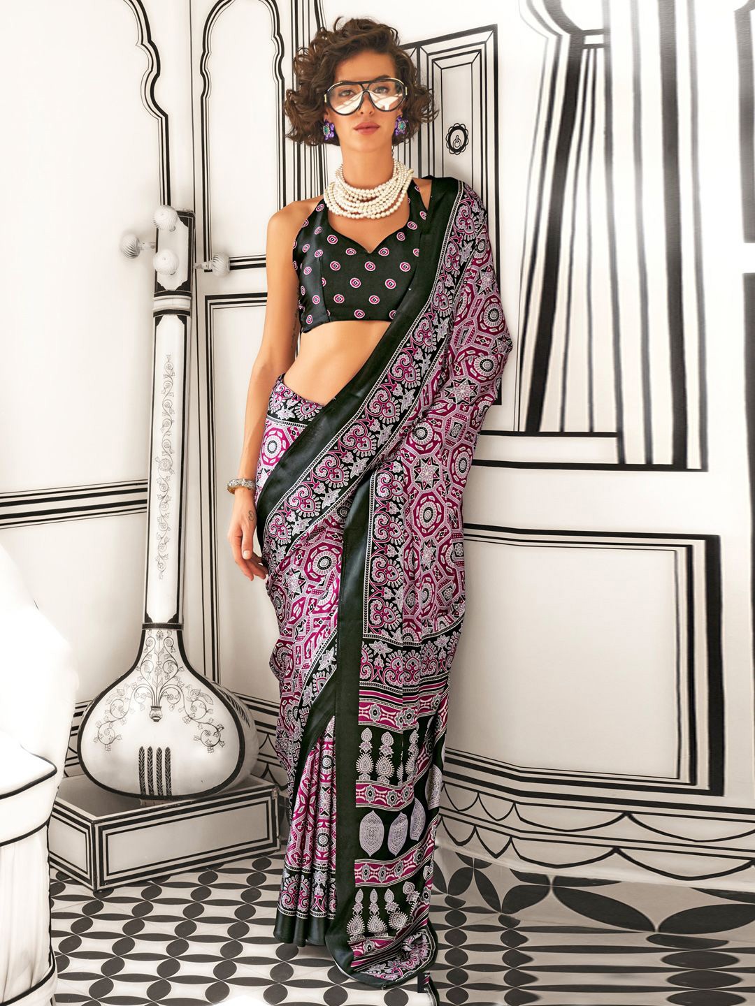 

Sangria Women Ethnic Motif Printed Sarees, Magenta