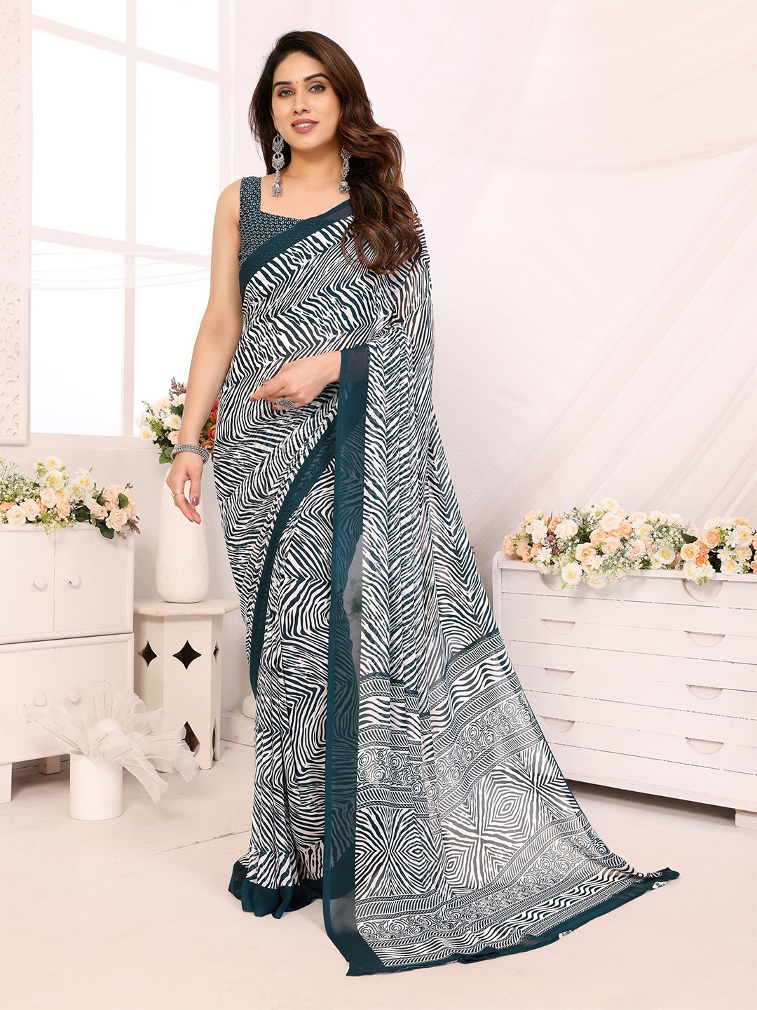 

Ambuja International Women Leheriya Printed Pure Georgette Leheriya Saree, Teal