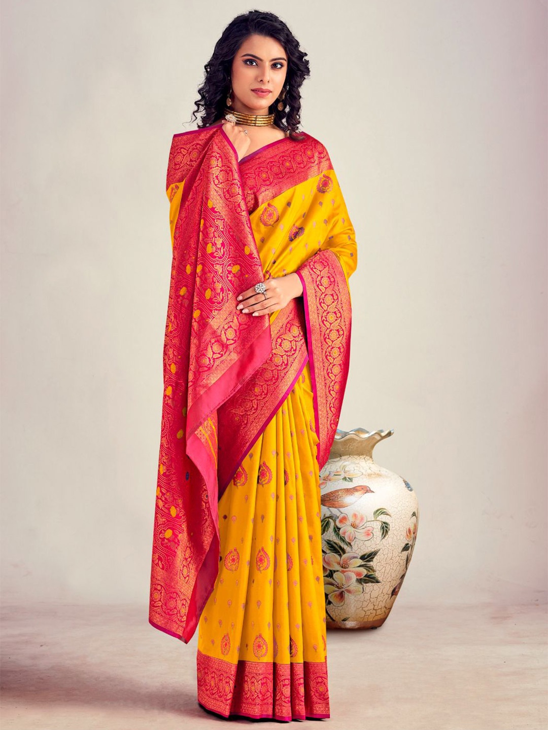 

NK Textiles Woven Design Zari Silk Blend Kanjeevaram Saree, Yellow