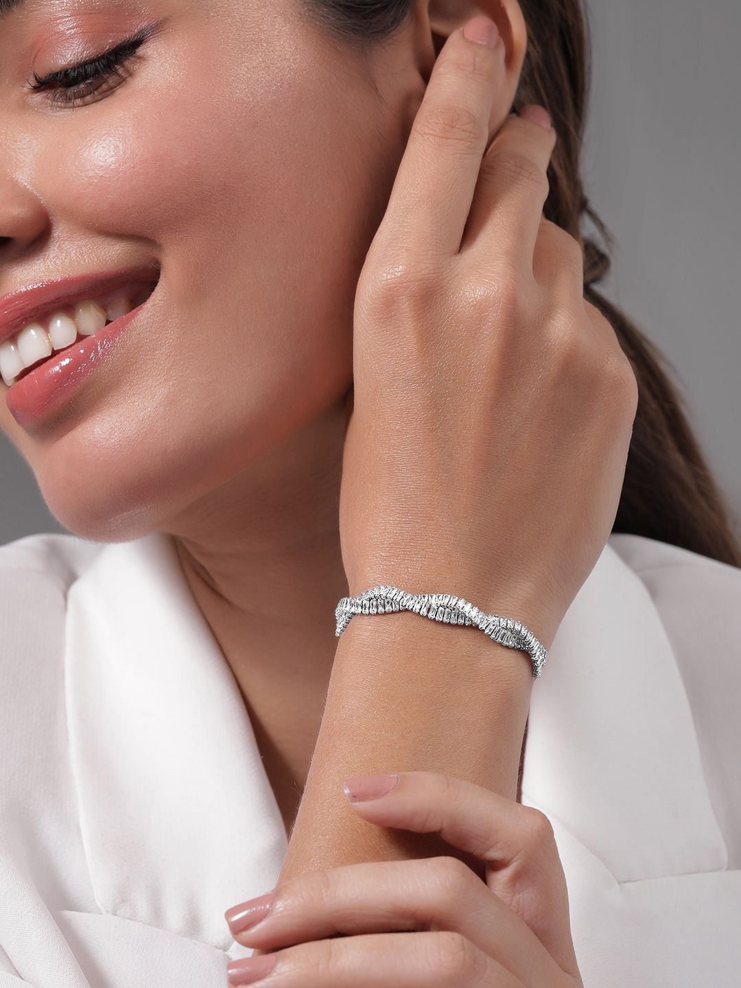 

Rubans Rhodium Plated Cubic Zicronia Studded Premium Adjustable Bracelet, Silver