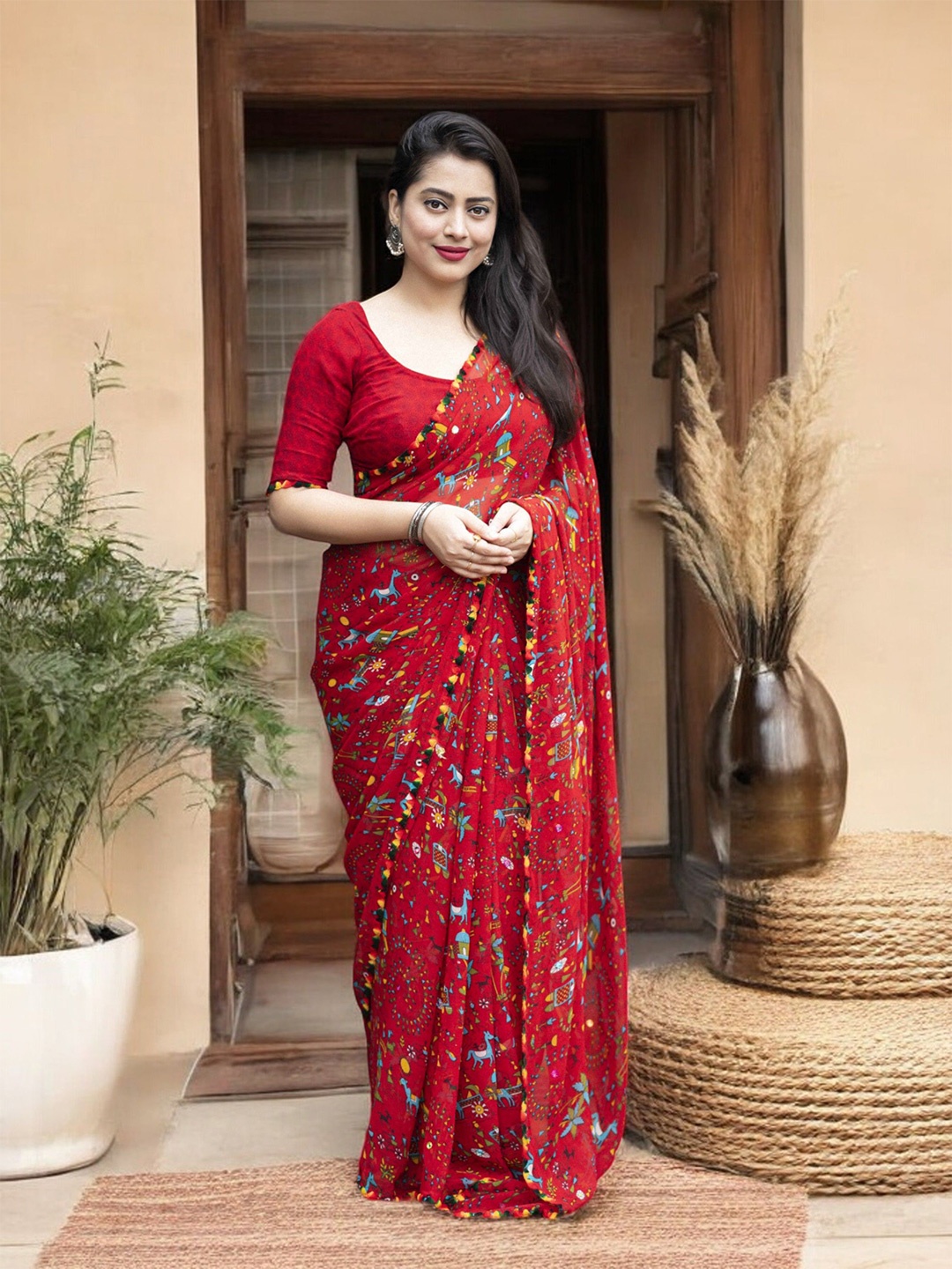 

Ambuja International Warli Aari Work Pure Georgette Saree, Red