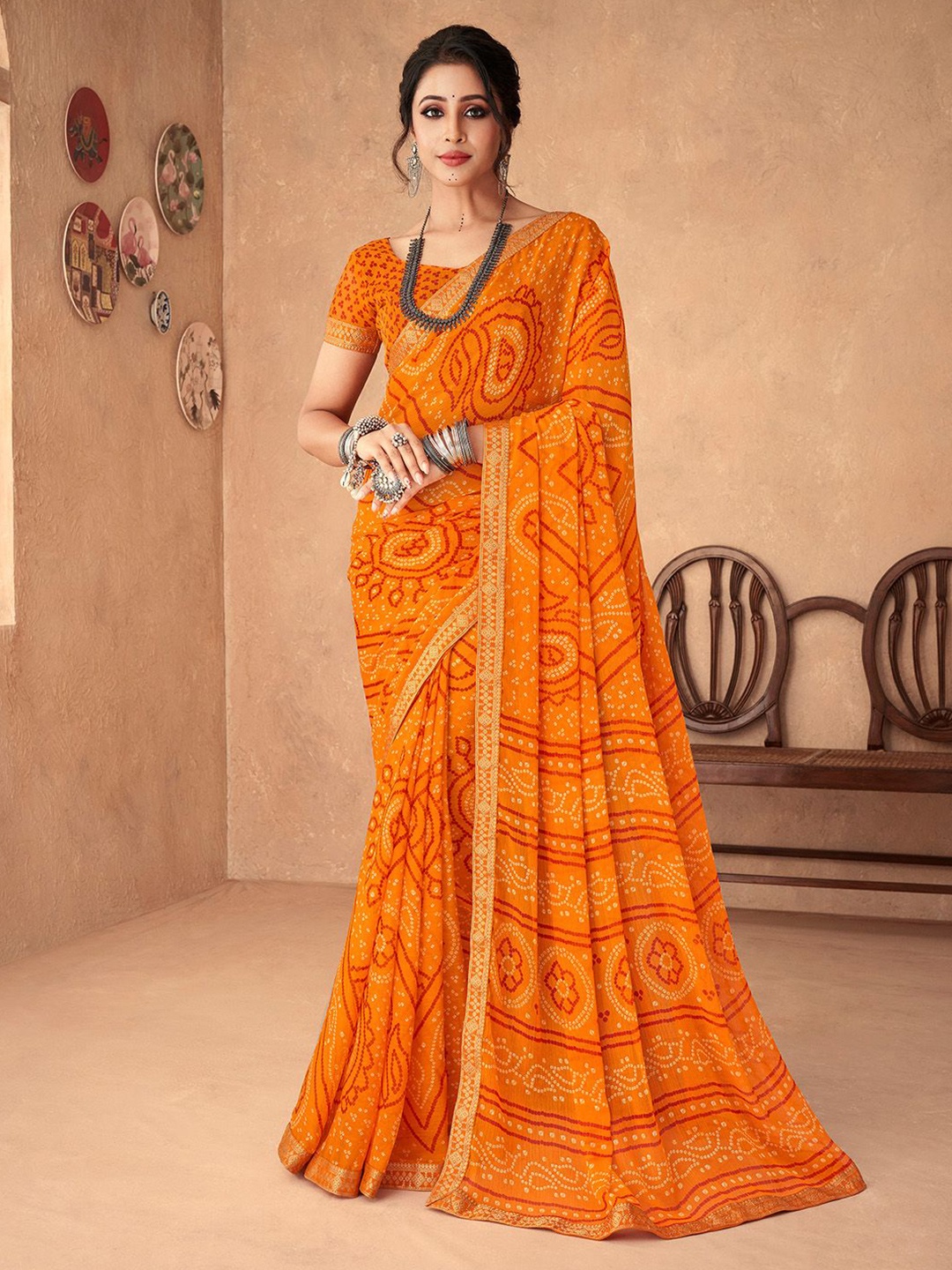 

Panzora Bandhani Zari Poly Chiffon Saree, Mustard