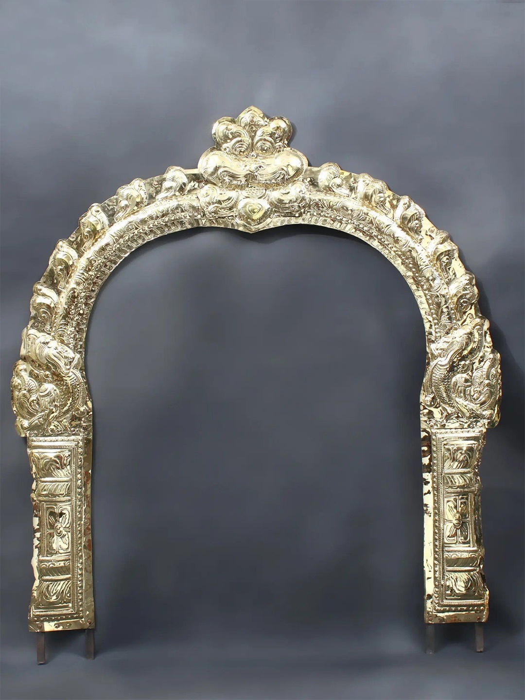 

Exotic India Gold-Toned Thiruvachi Arch Brass Temple Prabhavali