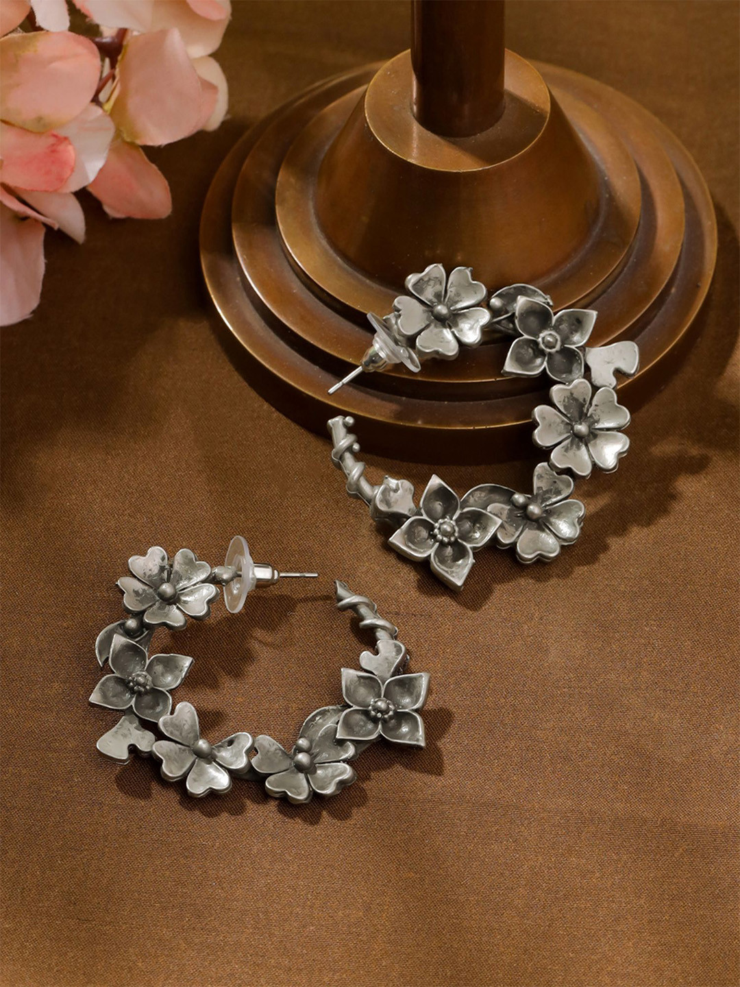 

Yellow Chimes Oxidised Silver Plated Floral Hoop Earrings