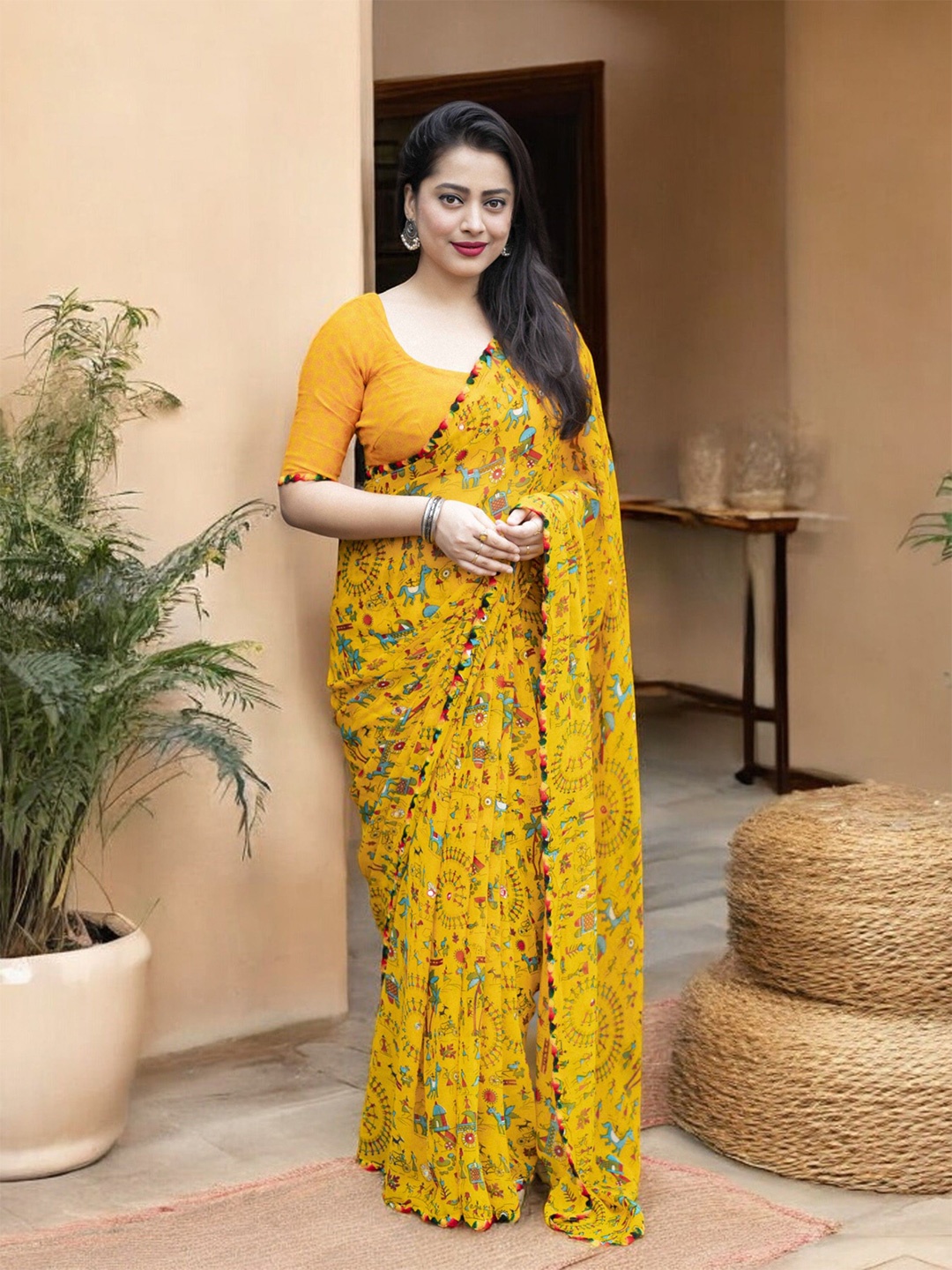 

Ambuja International Warli Pure Georgette Saree, Yellow