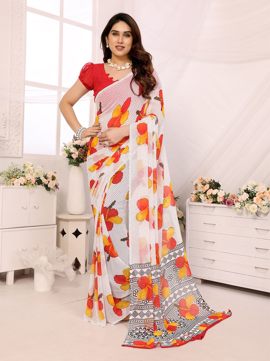 

Ambuja International Floral Pure Georgette Saree, White