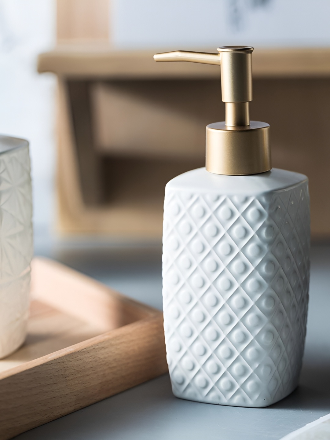 

The Better Home White & Gold-Toned Textured Ceramic Soap Dispenser 310 ml