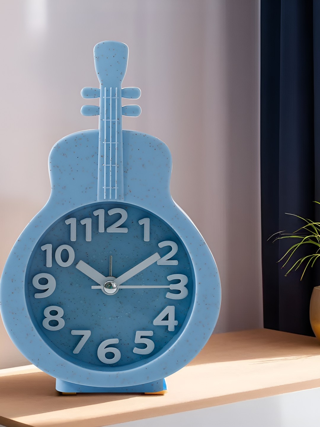 

The Better Home Blue & White Printed Violin Shaped Contemporary Table Clock