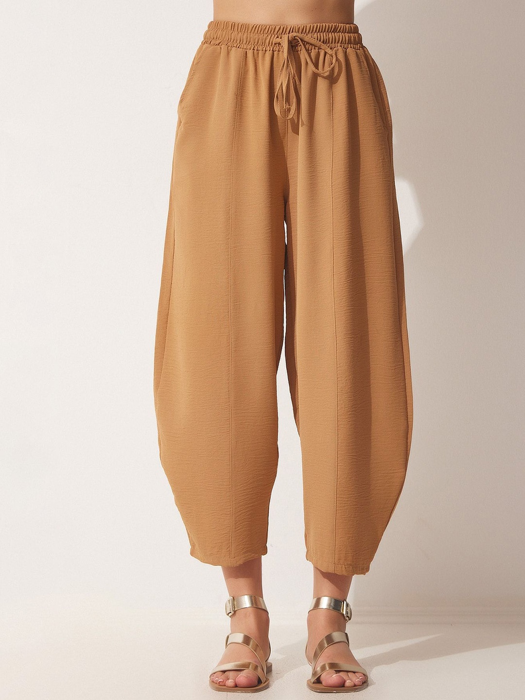 

Happiness istanbul Women High Rise Solid Jodhpuri Trousers, Beige