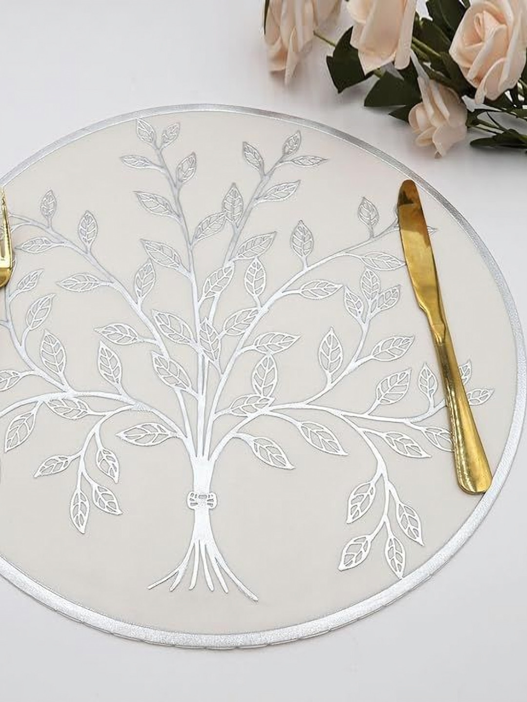 

Dakshya Industries Silver Toned & White 6 Pieces Floral Textured Round Table Placemats