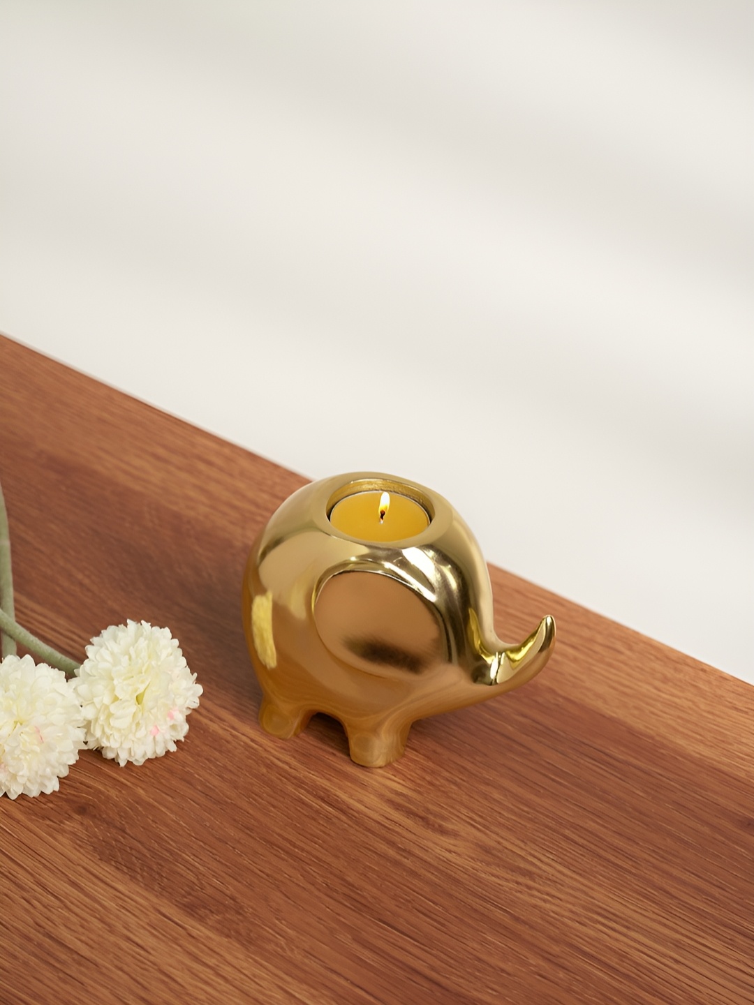 

Living scapes by Pantaloons Gold-Toned Elephant Shaped Candle Holder