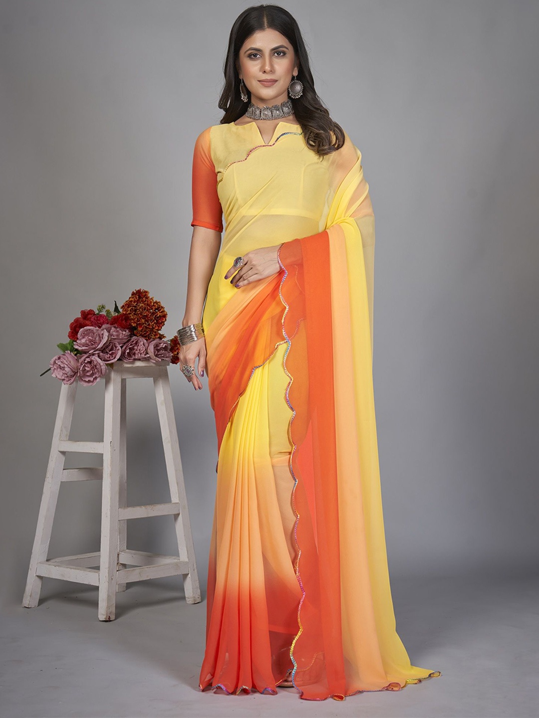 

Aika Colourblocked Pure Georgette Saree, Orange