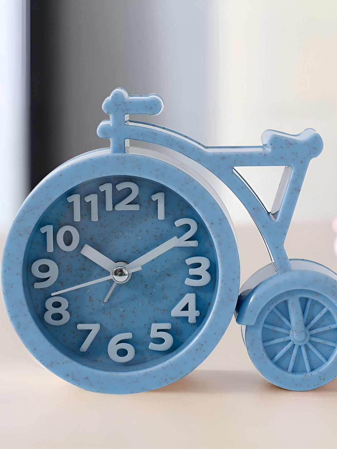 

The Better Home Blue & White Printed Cycle Shaped Contemporary Table Clock