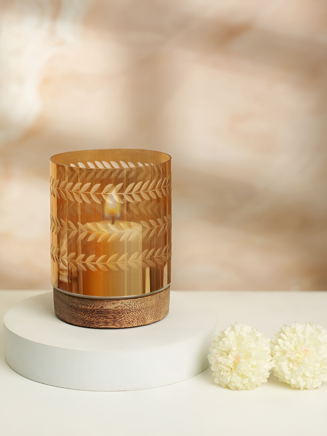 

Living scapes by Pantaloons Gold-Toned & Brown Cylindrical Shaped Candle Holder