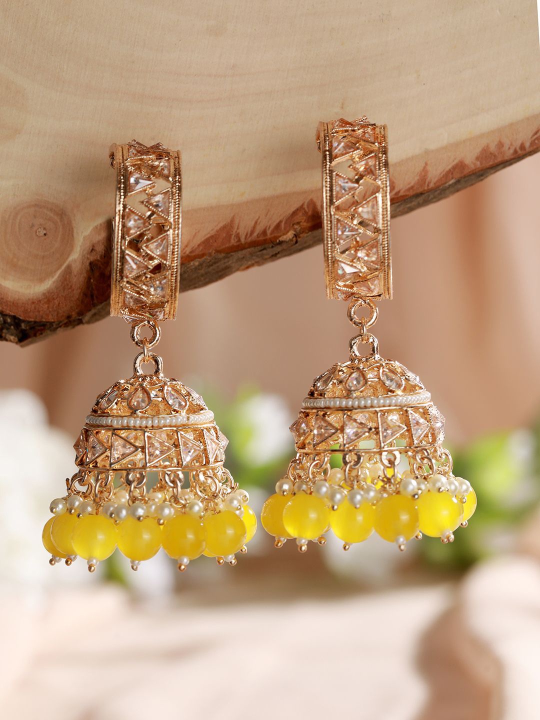 

Jazz and Sizzle Gold Plated Dome Shaped American Diamond Studded Jhumkas, Yellow