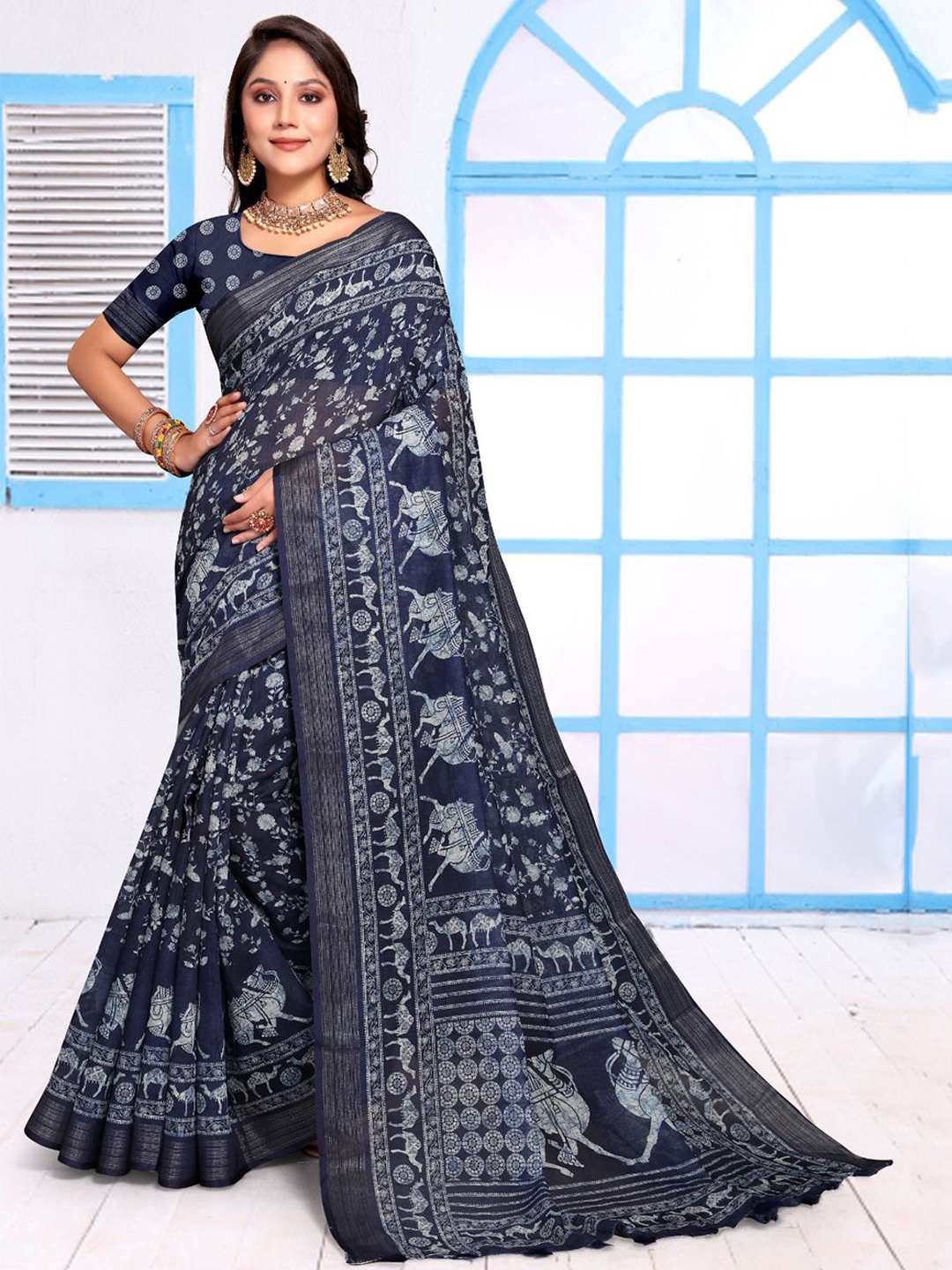 

Fevinaa Ajrak Block Zari Linen Blend Block Print Saree, Blue