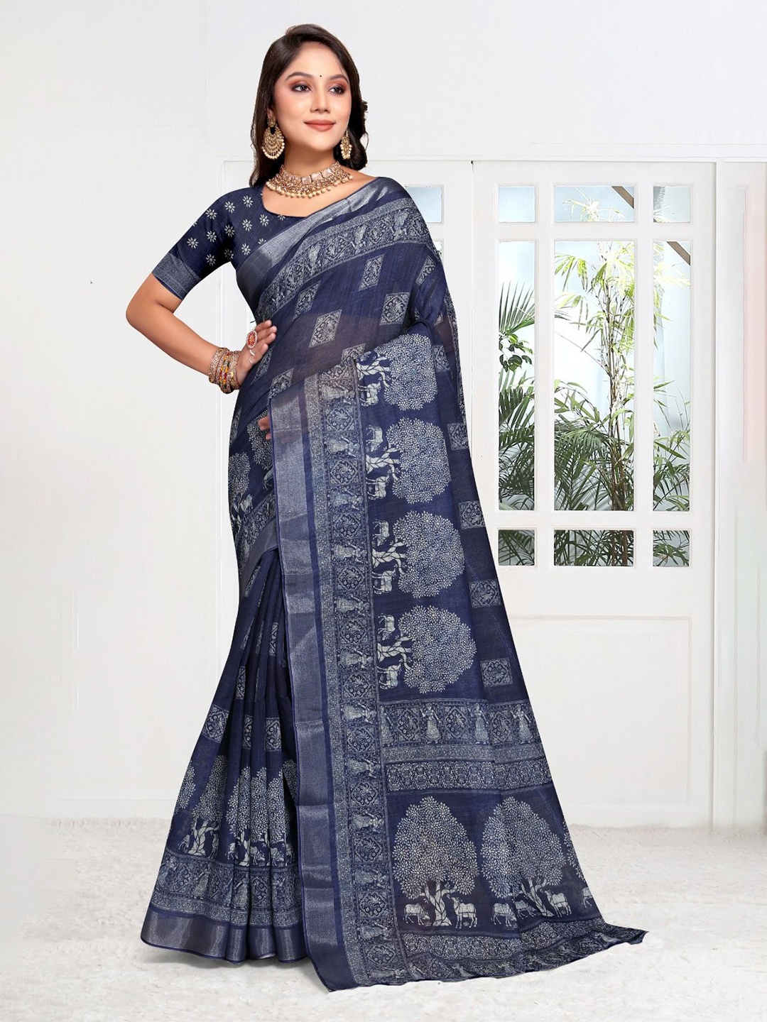 

Fevinaa Ajrak Block Zari Linen Blend Block Print Saree, Blue