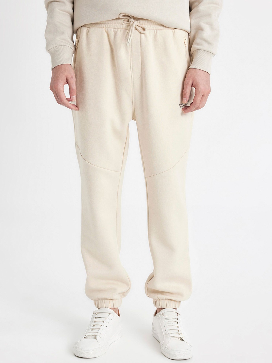 

DeFacto Men Regular Fit Solid Joggers Trousers, Off white