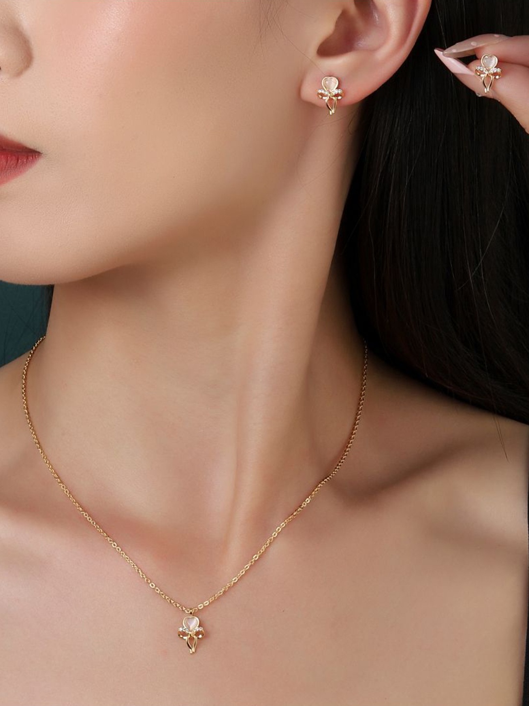 

SALTY Gold-Plated Glistening Bow Stone-Studded Necklace and Earrings