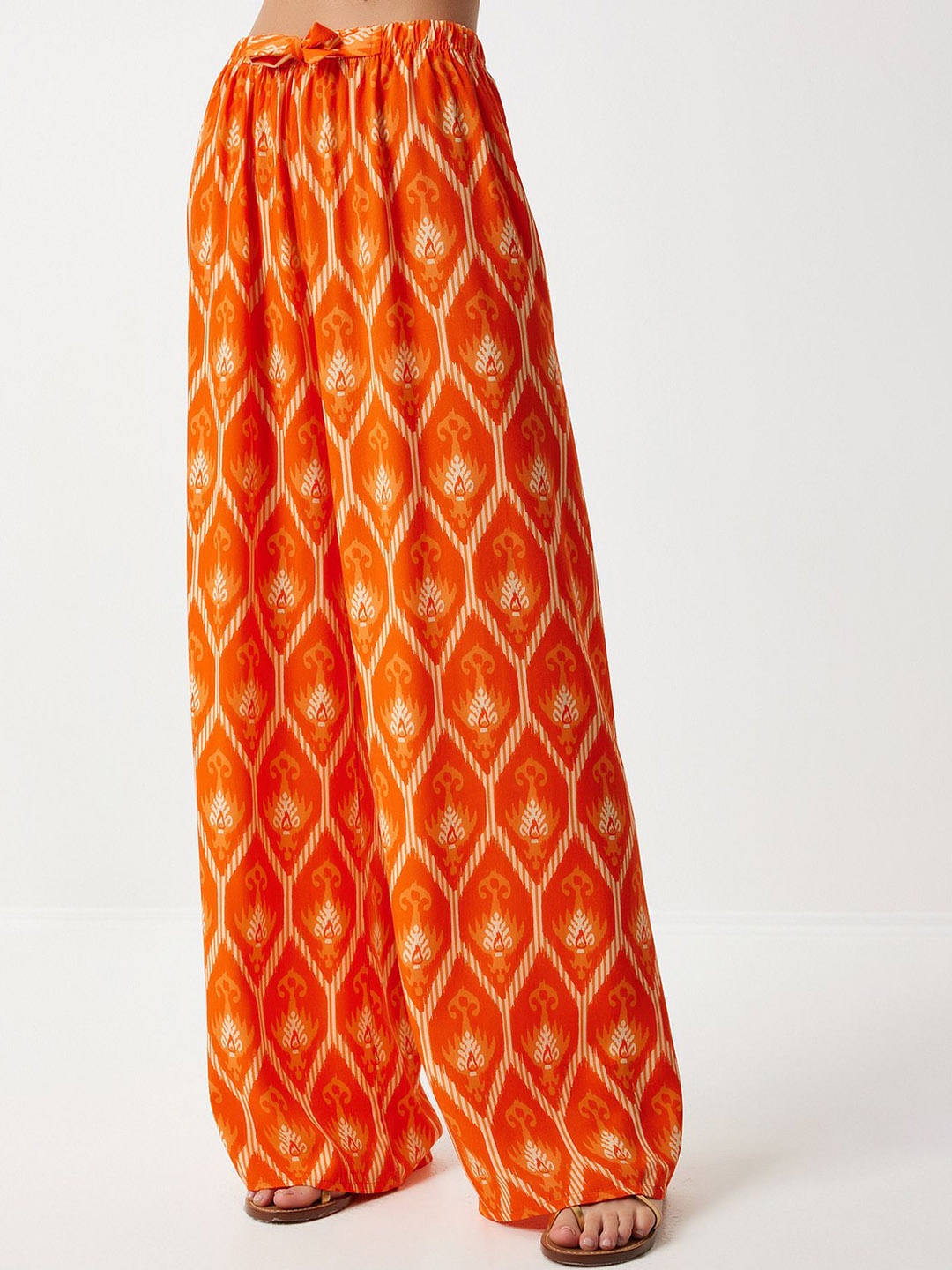 

Happiness istanbul Women Ethnic Motifs Printed Parallel Trousers, Orange