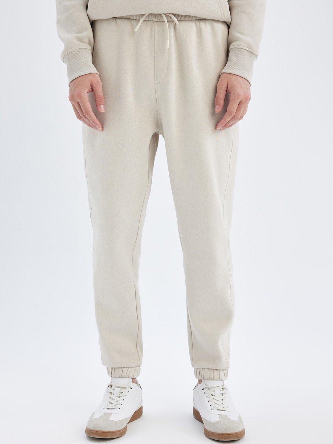

DeFacto Men Regular Fit Solid Joggers Trousers, Off white