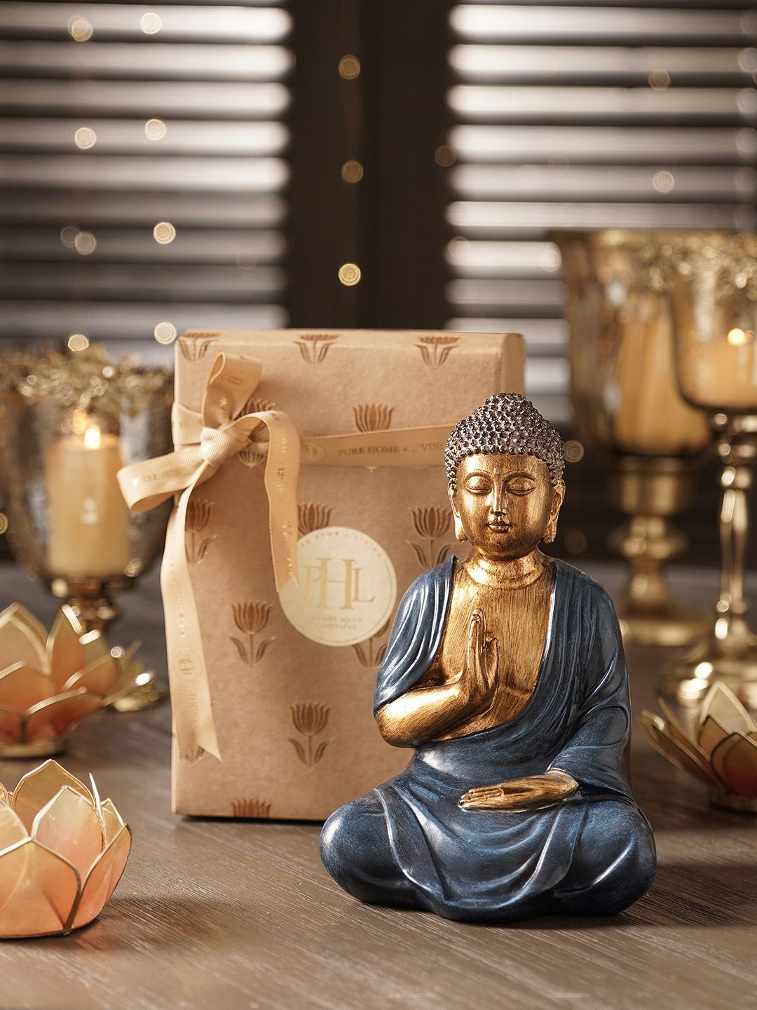 

Pure Home and Living Blue & Gold Toned Buddha Idol Showpiece