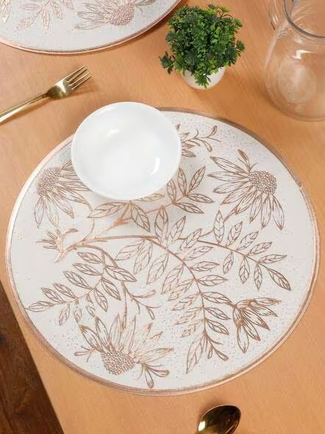 

Dakshya Industries 4 Pieces Copper-Toned & White Floral Round Table Placemats