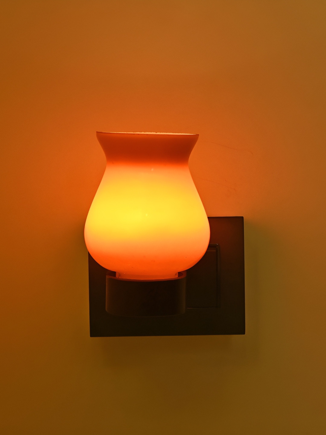 

Afast Orange & Brown Glass Contemporary Cylindrical Shaped Wall Lamp