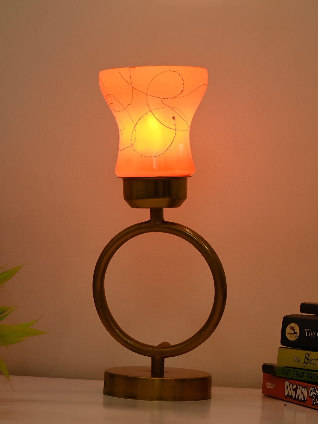 

Afast Orange & Gold Toned Printed Bell Shaped Glass Table Lamp With Adjustable Cord