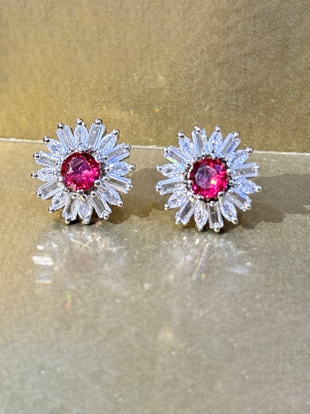 

The Jewellery Tale Rhodium-Plated Emerald Studded Circular Studs Earrings, Red
