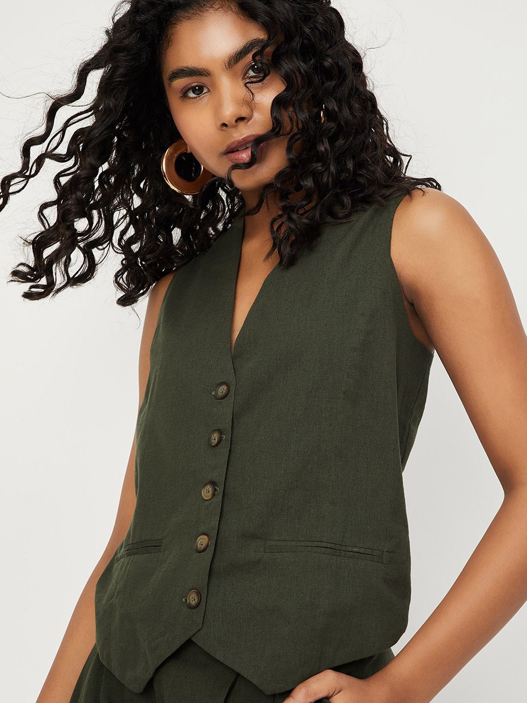 

Max x Kalki Women Solid Waistcoat Style Top, Olive