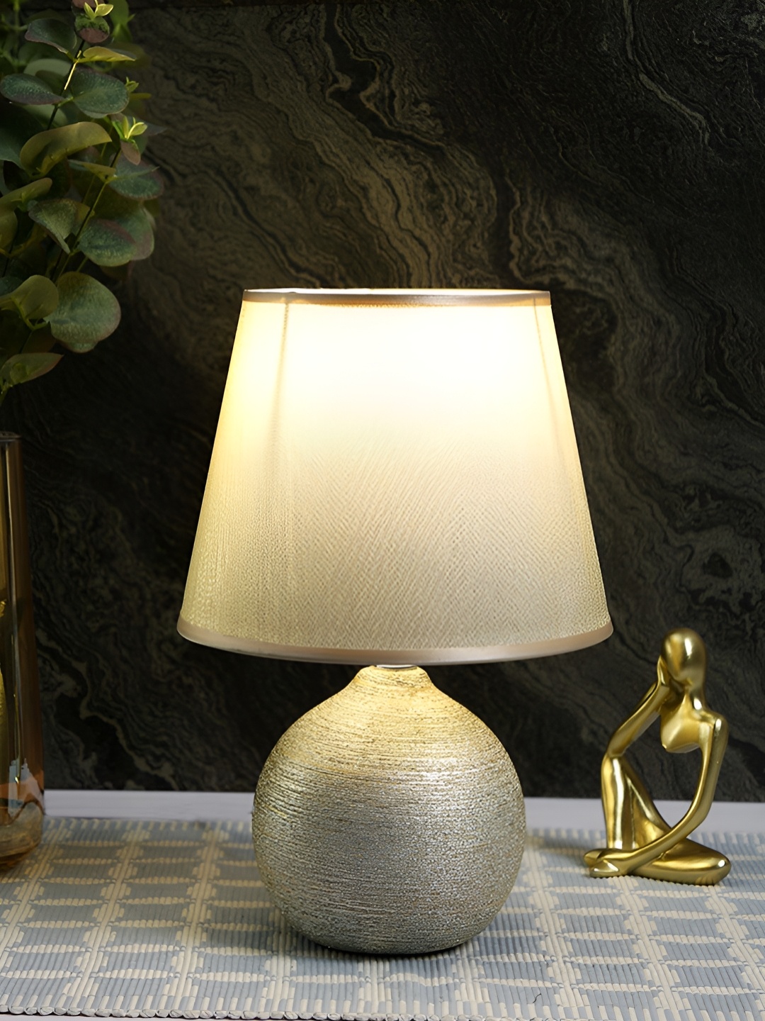 

TAYHAA Grey & Gold-Toned Textured Ceramic Contemporary Frusturical Shaped Table Lamp