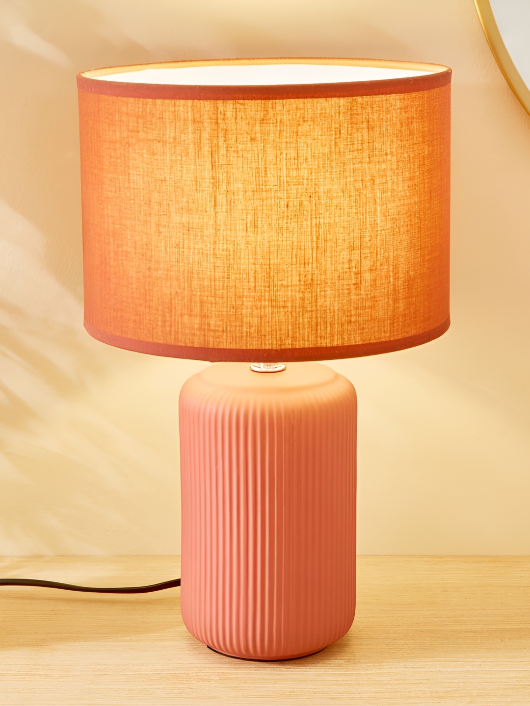 

Home Centre Glint Dublin Peach-Coloured Ceramic Contemporary Cylindrical Shaped Table Lamp