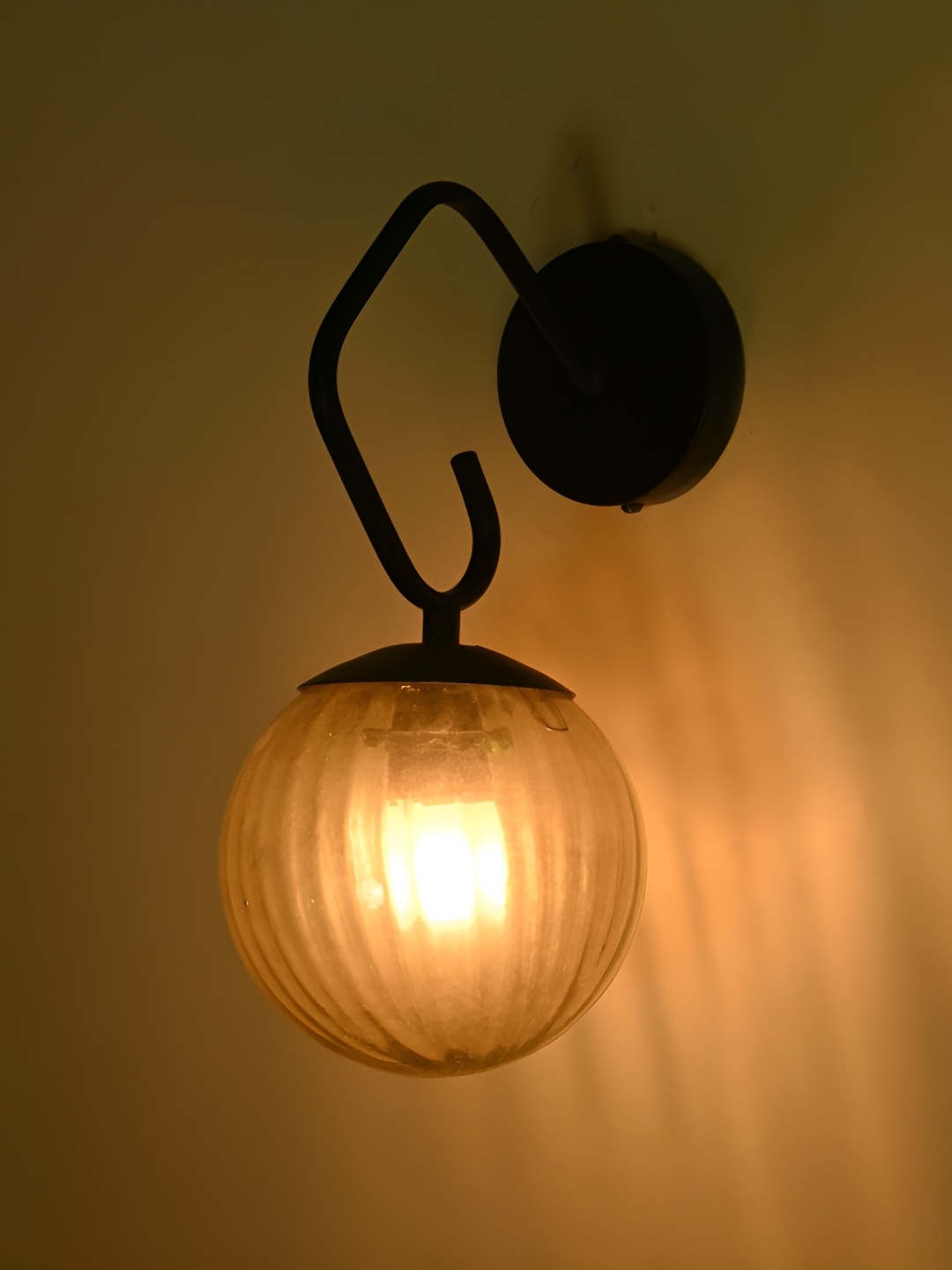 

Afast Gold Toned & Black Glass Contemporary Spherical Shaped Wall Lamp