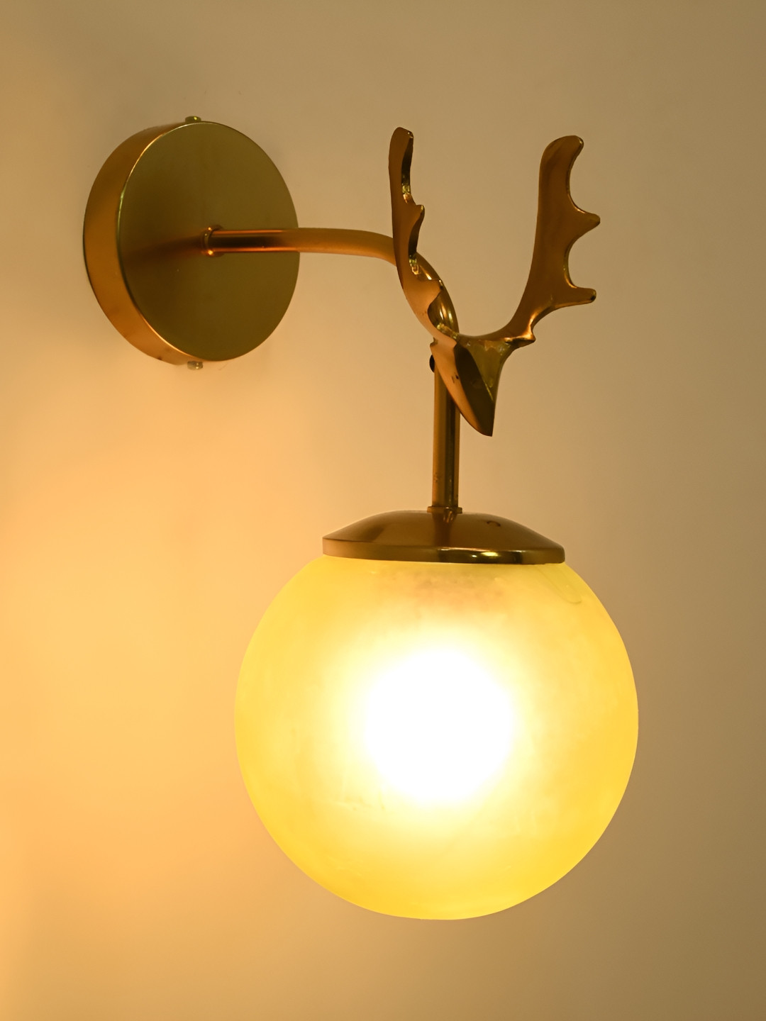 

Afast Yellow & Gold Toned Glass Contemporary Spherical Shaped Wall Lamp
