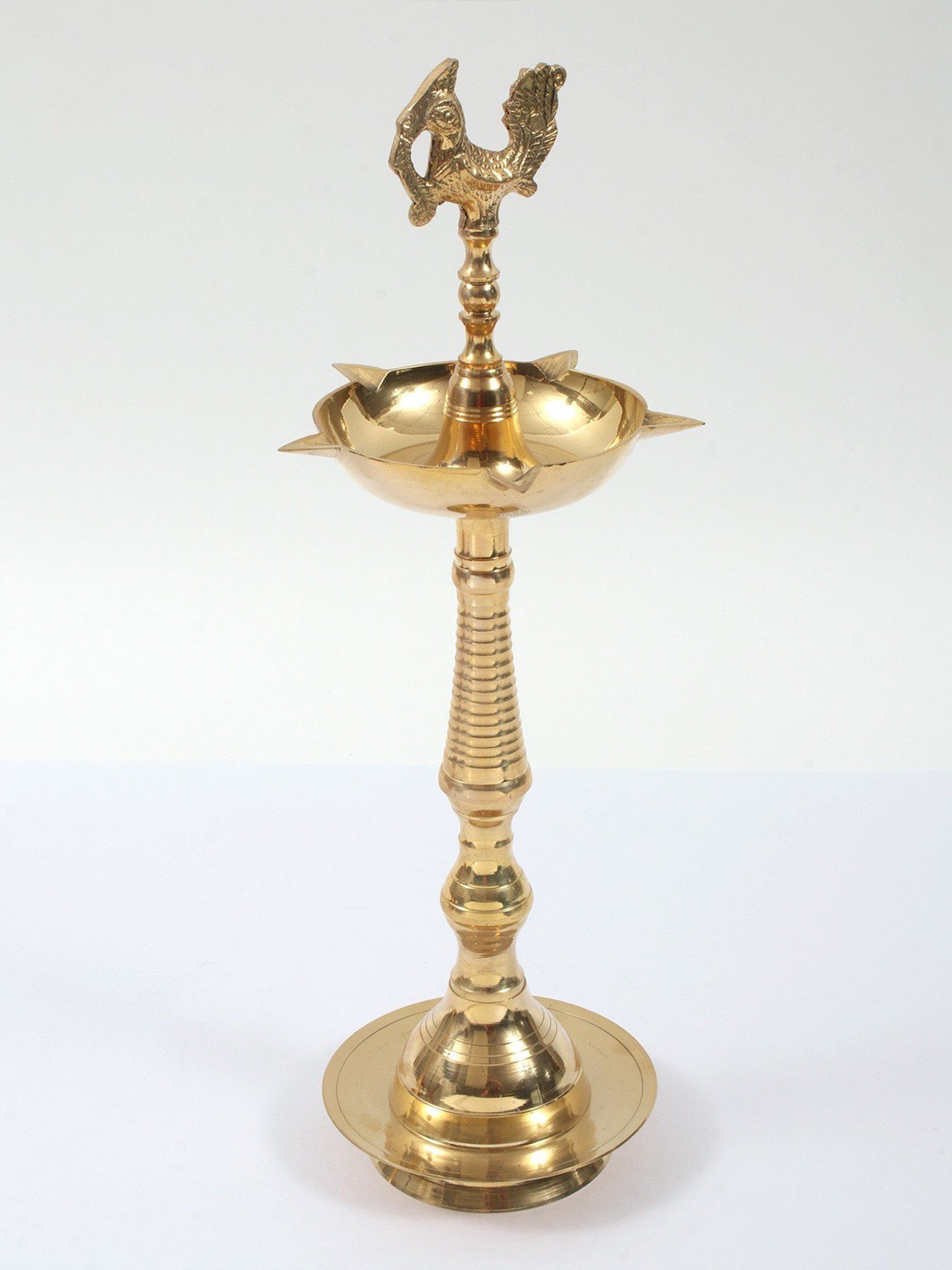 

Exotic India Gold Toned Five Wicks Peacock Brass Pooja Diya