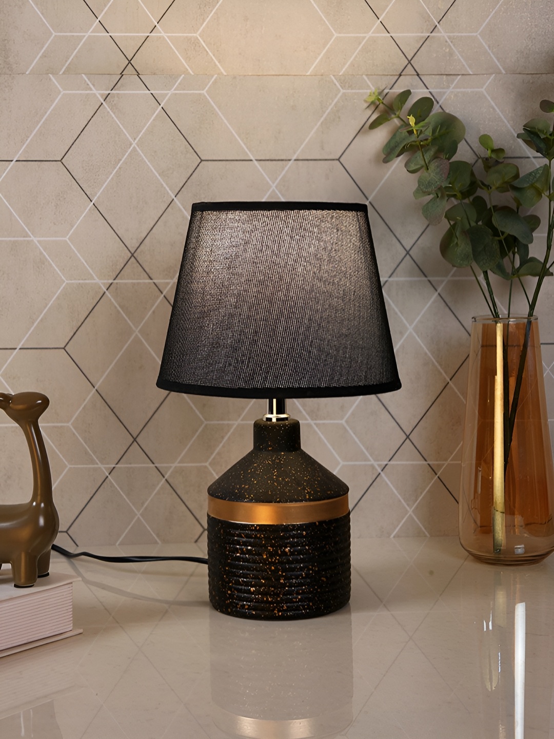 

TAYHAA Black & Gold-Toned Textured Ceramic Contemporary Frusturical Shaped Table Lamp