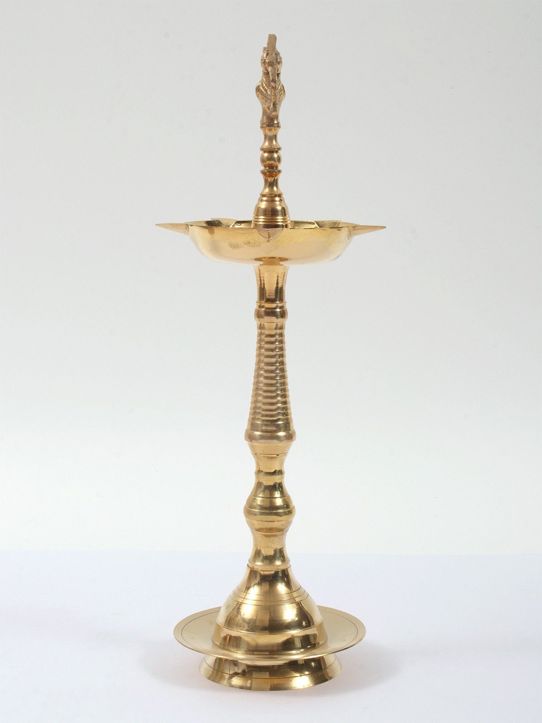 

Exotic India Gold Toned Textured Brass Pooja Diya