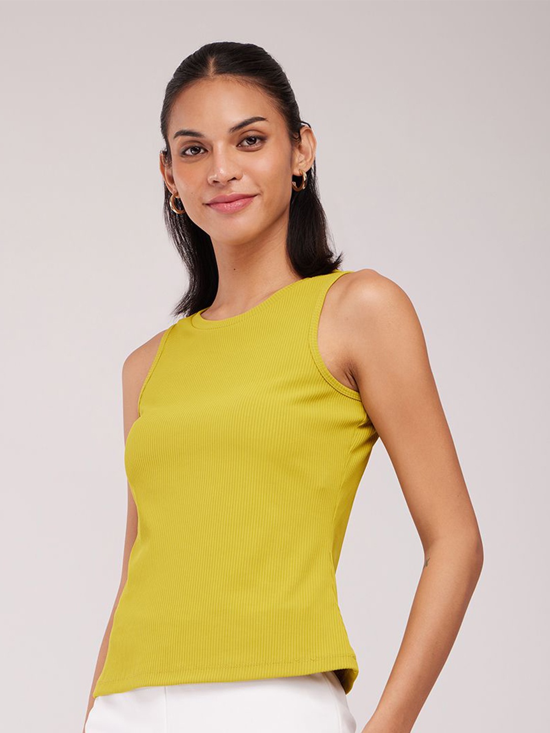 

FableStreet Women Solid Round Neck Top, Yellow