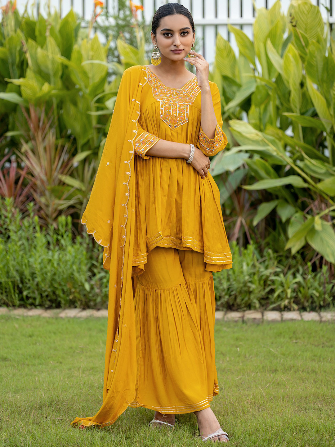 

MITTOO Ethnic Motifs Embroidered Sequinned Pure Silk A-Line Kurti With Sharara & Dupatta, Yellow
