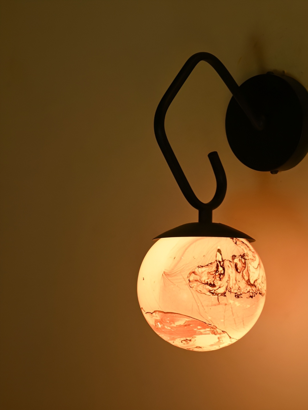 

Afast Brown & Black Abstract Printed Glass Contemporary Spherical Shaped Wall Lamp