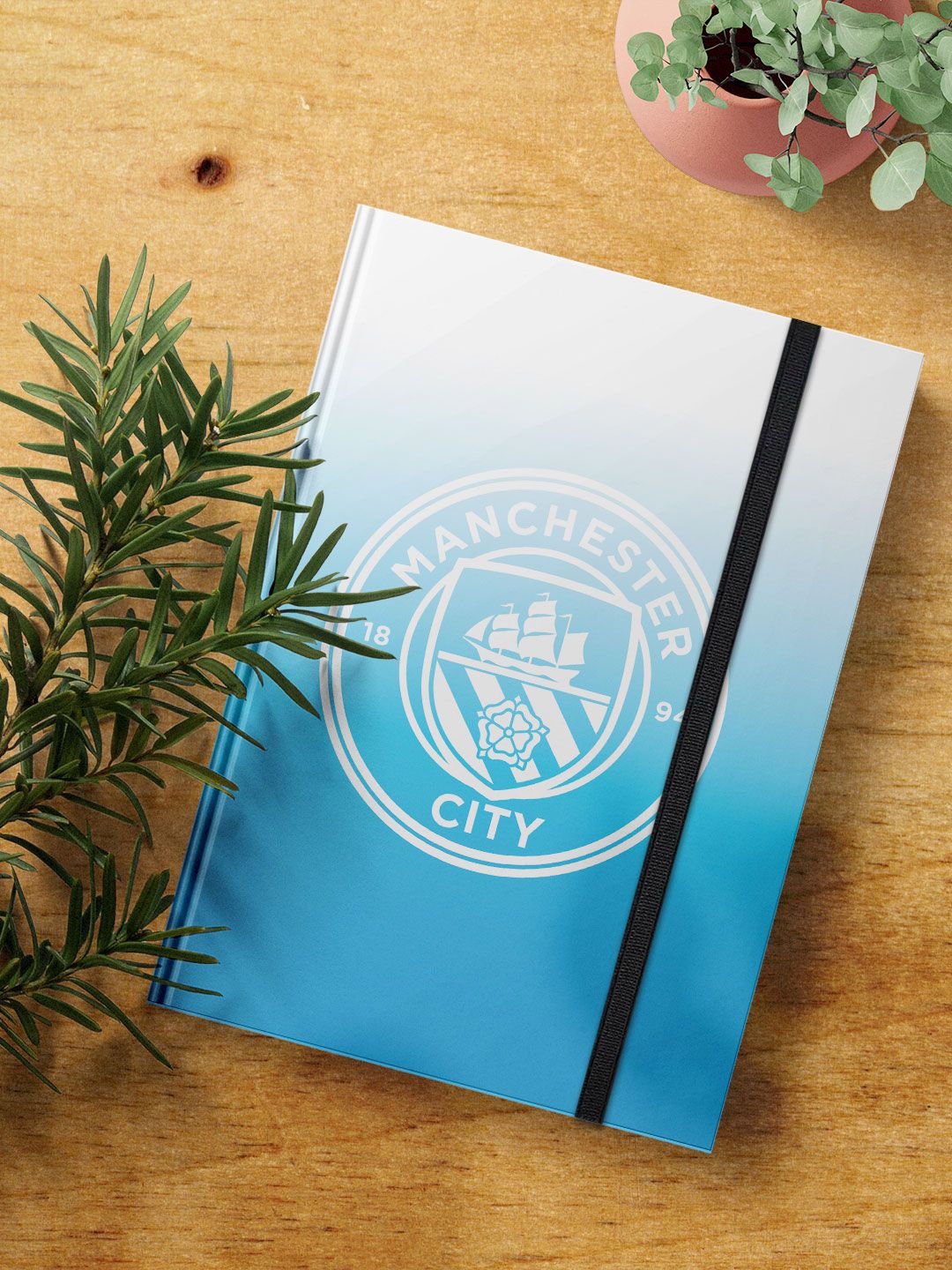 

FanCode Manchester City Sigil Printed Hard Cover A5 Ruled Notebook, Blue