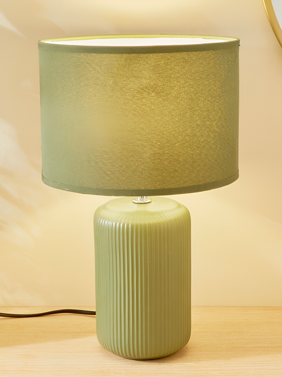 

Home Centre Glint Dublin Green Ceramic Contemporary Cylindrical Shaped Table Lamp