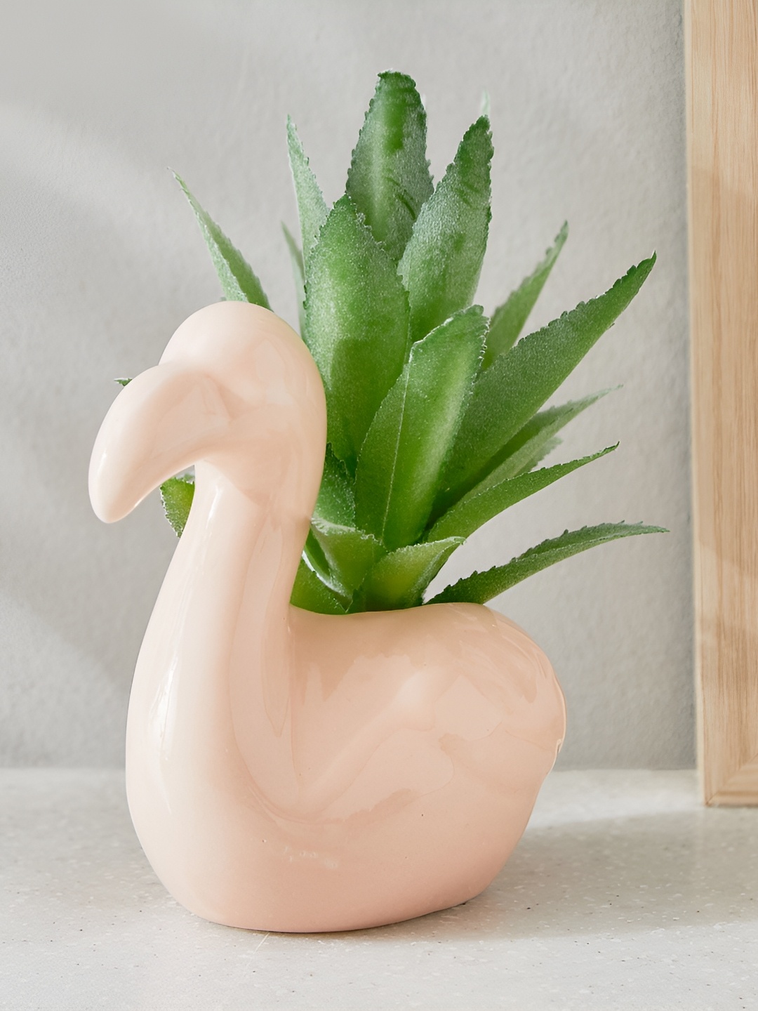 

Home Centre Gloria Pink Marine Artificial Succulent in Ceramic Swan Plot