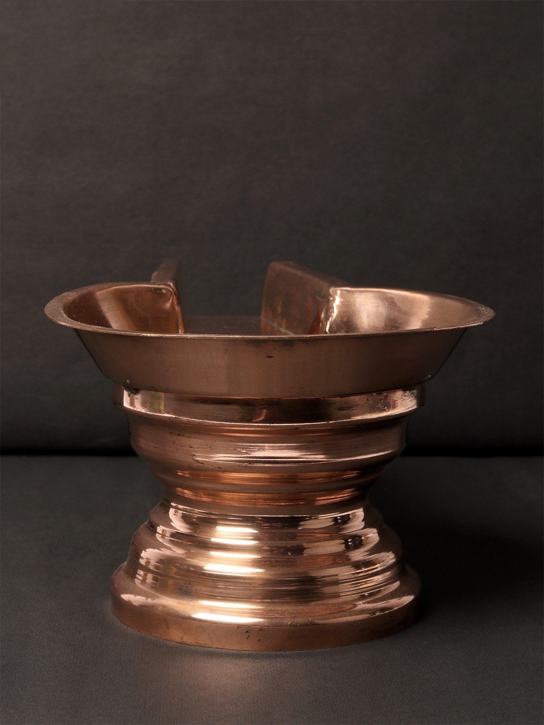 

Exotic India 10'' Copper Abhisheka Patra with Base